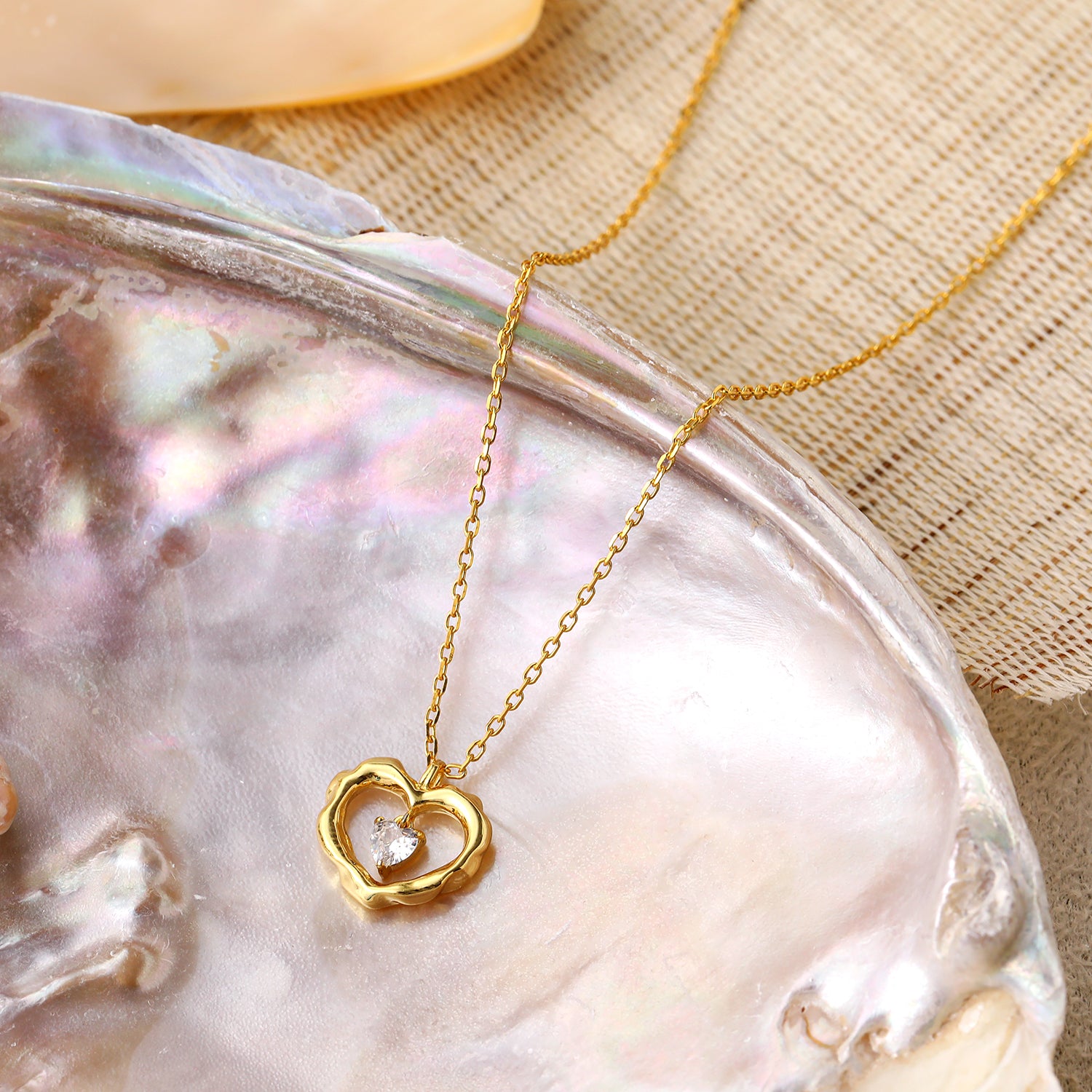Dancing Hollow Heart Silver Necklace